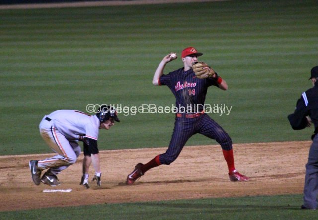 Evan Potter finishes the double play.