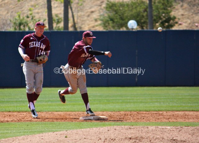 Mikey Reynolds turns a double play himself.