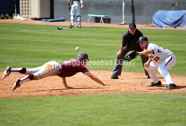 Brandon Wood gets back to first base.