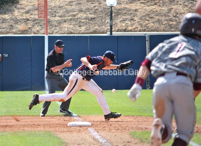 Sam Meyer can't make a play as a ball goes foul.