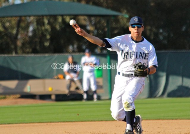 Chris Rabago fires to first.