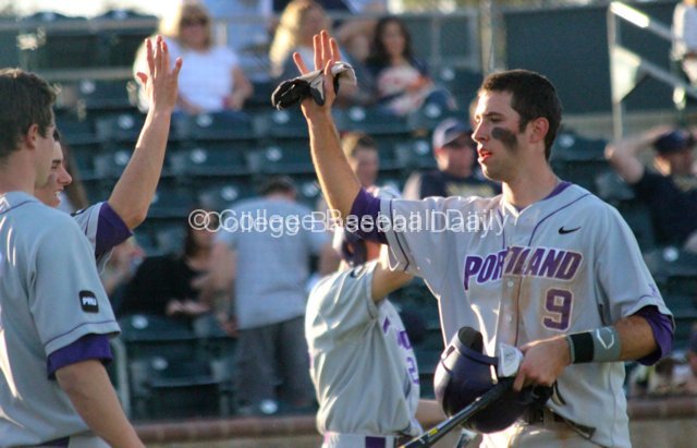 Cody Lenahan gets congratulated after scoring.