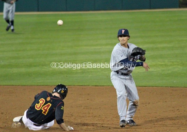 Richy Pedroza turns the double play.