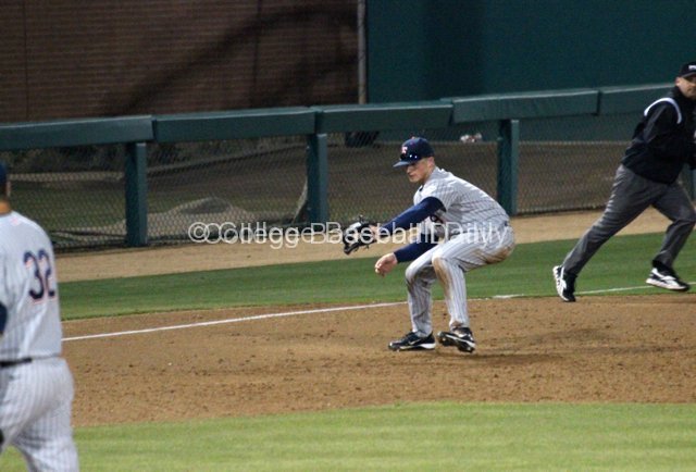 Matt Chapman makes a back-handed stop.