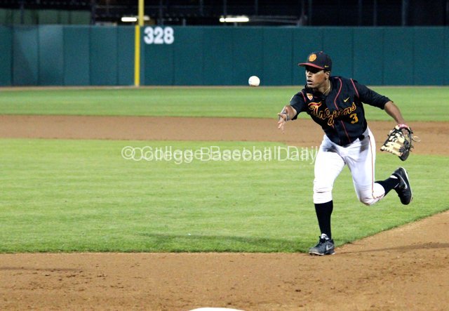 Dante Flores flips to the pitcher.