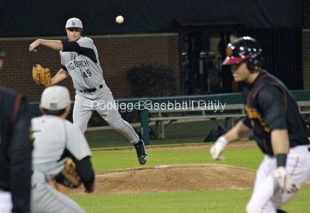 Nick Sabo chases a runner back to first.