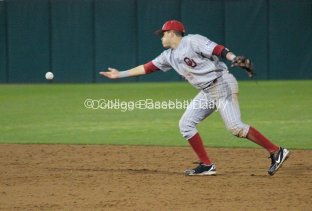 Hector Lorenzana flips to second base.