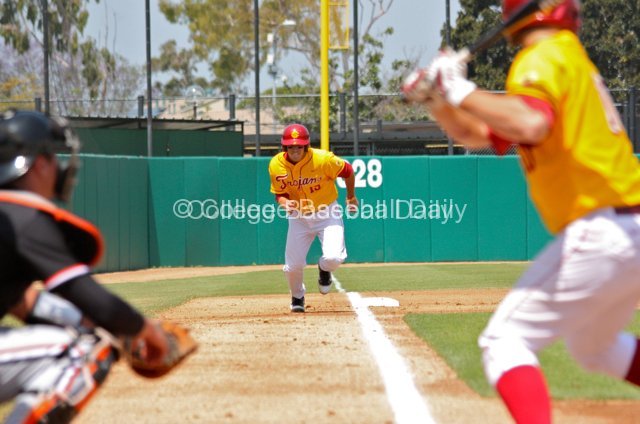 James Roberts charges down the third base line.