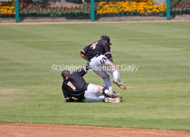 John Tommasini is taken out by his sliding SS Tyler Smith.