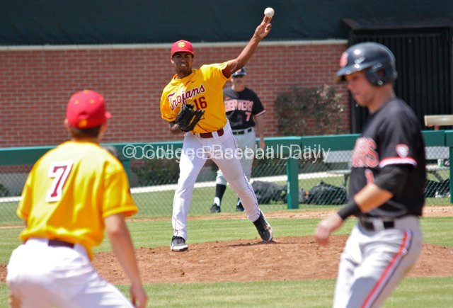 Stephen Tarpley throws to first to keep Tyler Smith close.
