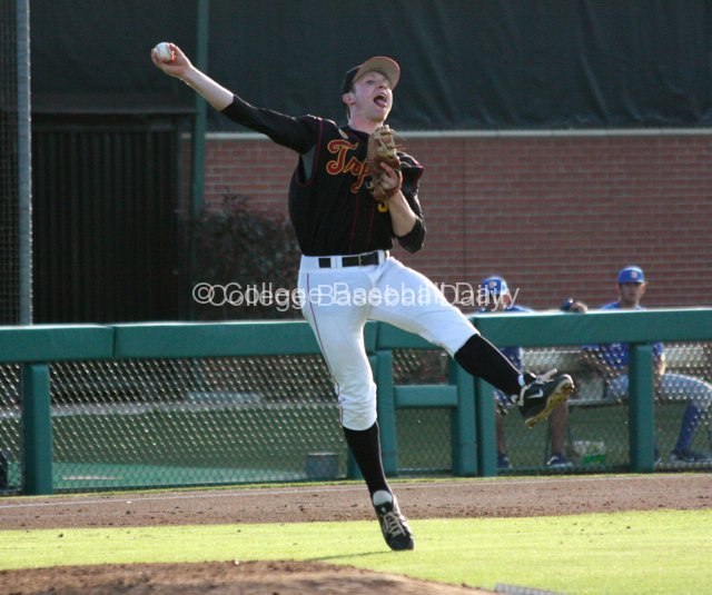 Kevin Swick robs a bunt single.