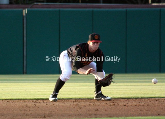 Adam Landecker takes a grounder.