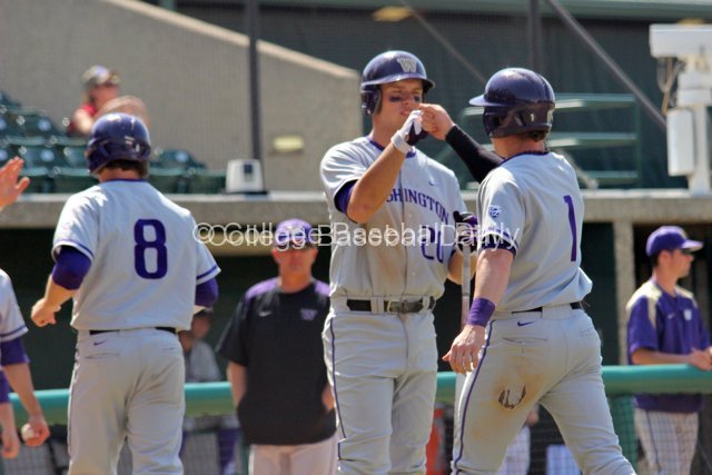 Jayce Ray is congratulated by Trevor Mitsui after scoring.