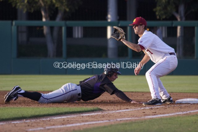 Jayce Ray gets back to first base.