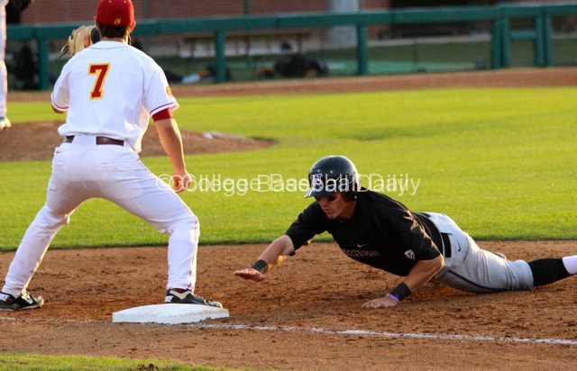 Jacob Lamb dives back into first.