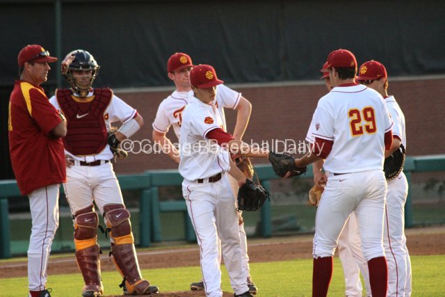 James Guillen hands the ball to Matt Munson.