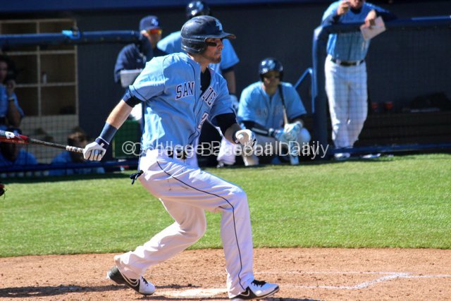 Louie Lechich lines a hit.