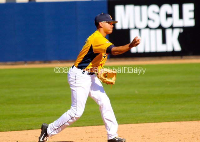 Derek Toadvine throws to first.
