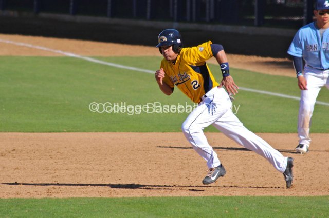Derek Toadvine takes off from first.